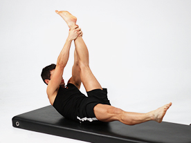 How to do the Pilates Scissors?